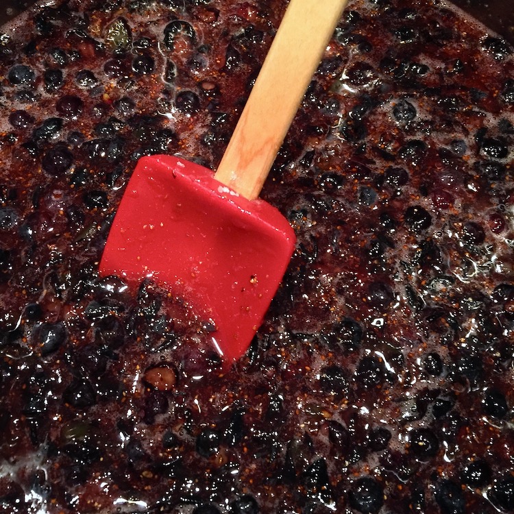 Fruit and sugar mixture for Blueberry-Grape Jam after it has macerated for 2 hours