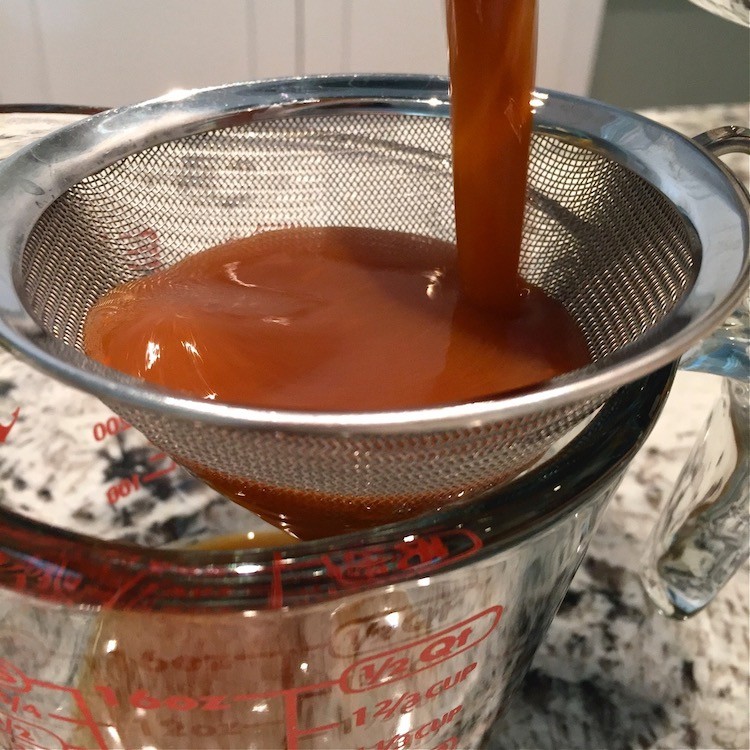 Straining Pumpkin Spice Latte Syrup
