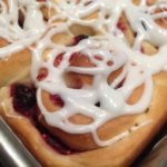 Closeup of Cranberry Orange Sweet Rolls with Icing