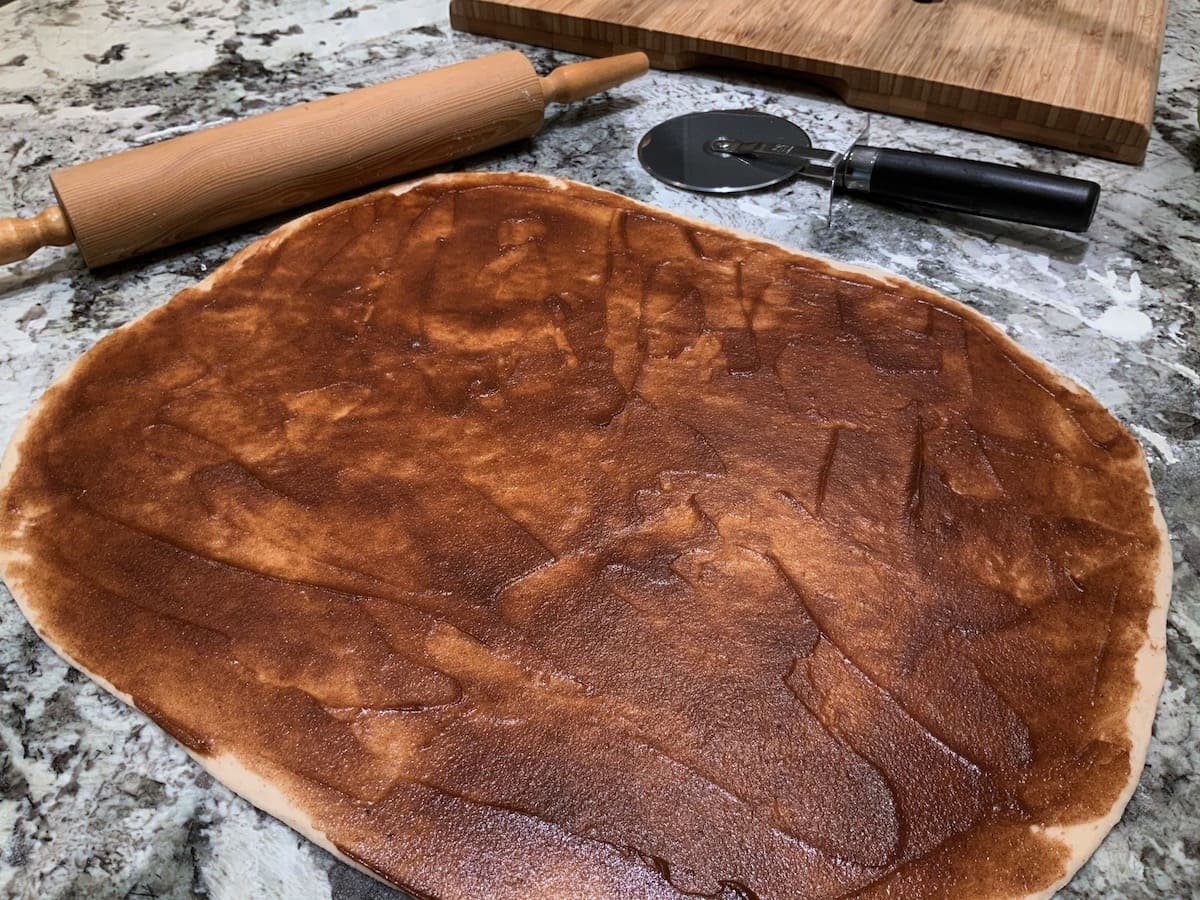 Cinnamon filling spread over dough for Cinnamon Pull-Apart Bread